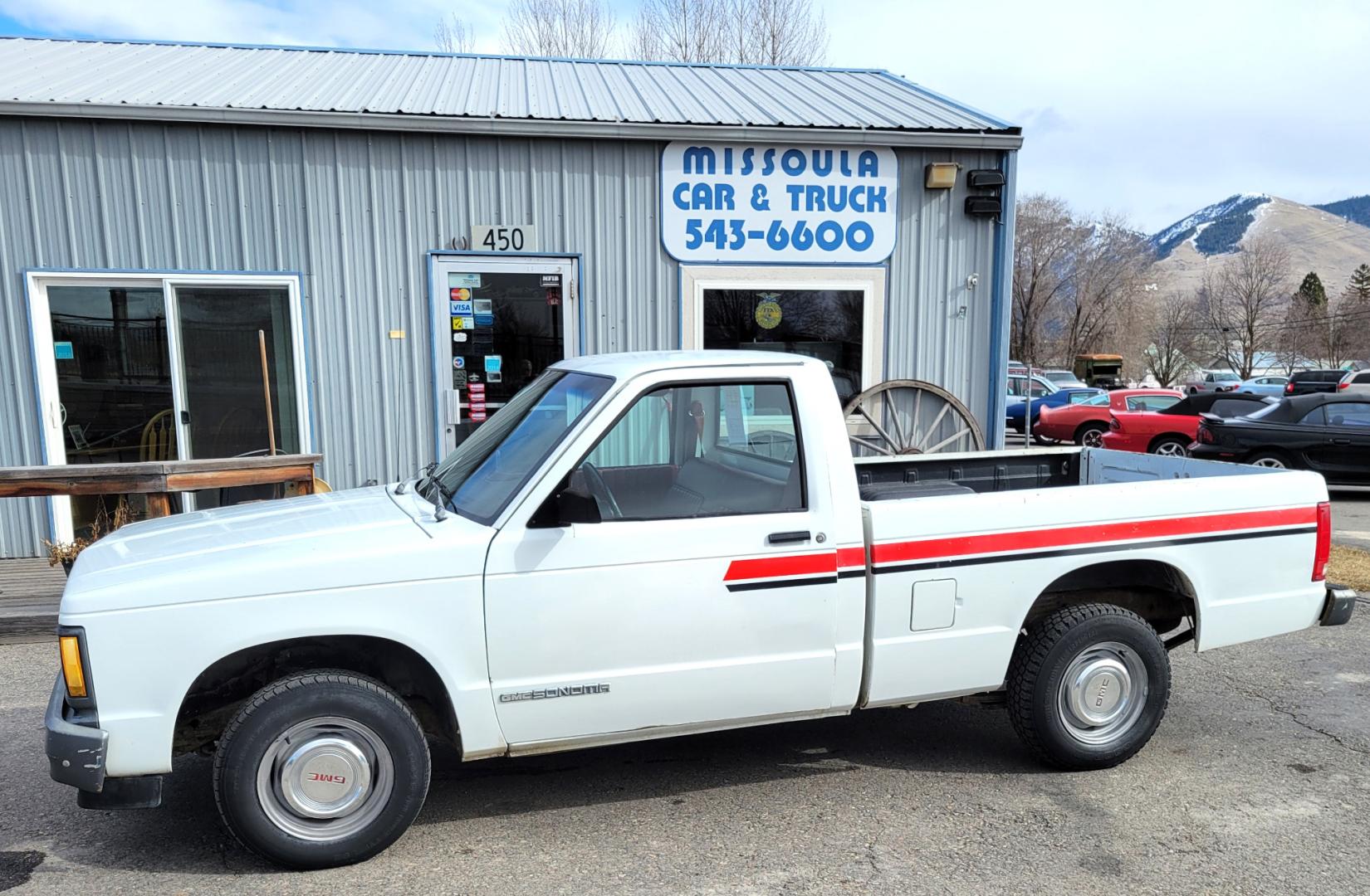 1991 White /Red GMC Sonoma Special (1GTCS14E9M8) with an 2.5L I4 engine, 5 Speed manual transmission, located at 450 N Russell, Missoula, MT, 59801, (406) 543-6600, 46.874496, -114.017433 - 2.5L I4 Engine. 5 Speed Manual Transmission. Runs and Drives well. Financing NOT Available on this Vehicle. - Photo#0